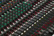 Closeup of a concert sound control board.