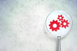 Web development concept:  Gears with optical glass on digital ba