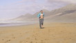 Man jogging on beautiful beach, super slow motion, 240fps
