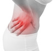 Acute pain in a woman abdomen. Female holding hand to spot of Ab