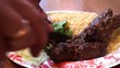 Arabic fast food (kabobs with rice & vegetables)