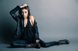 Foto: Fashion model wearing leather pants and jacket Fashion model wearing leather pants and jacket