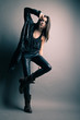 Foto: Fashion model wearing leather pants and jacket Fashion model wearing leather pants and jacket