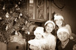 Vintage photo of happy  family at Christmas time