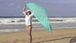 Sexy woman with pareo on beach, super slow motion, 240fps