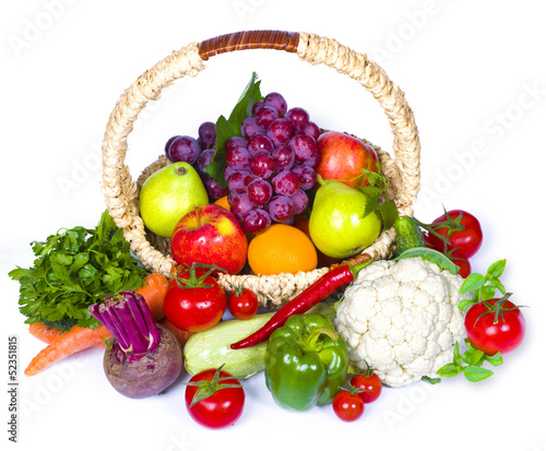 Photo: Composition of fruits and vegetables in wicker basket Composition of fruits and vegetables in wicker basket