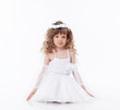 Photo: Image of cute little angel isolated on white Image of cute little angel isolated on white