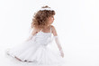 Photo: Adorable little angel isolated on white Adorable little angel isolated on white