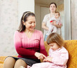 Two women with children