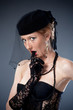 woman in hat and veil and underwear