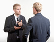 two businessmen discussing