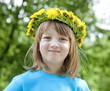 child with a flower wreath