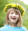 child with a flower wreath