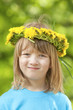 child with a flower wreath