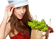 Young woman with a grocery shopping bag. Isolated on white backg