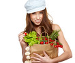 Young woman with a grocery shopping bag. Isolated on white backg