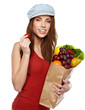 Young woman with a grocery shopping bag. Isolated on white backg
