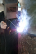 welder cooks an pipe