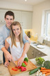 Couple working in the kitchen