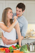 Woman having fun by feeding man