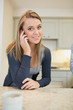 Cheerful woman phoning