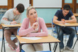 Thoughtful students studying in a classroom
