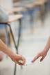 Two students cheating while doing a test