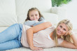 Daughter and mother relaxing together