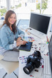Photo: Photo editor working with graphics tablet Photo editor working with graphics tablet