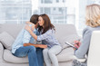 Photo: Couple reaching break through in therapy session Couple reaching break through in therapy session
