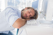 Man sleeping on his desk