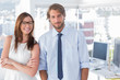 Design team standing in office