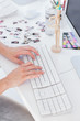 Photo: Close up of womans hands typing Close up of womans hands typing