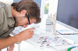 Editor looking at the contact sheet