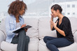 Sad woman speaking to her therapist
