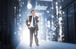 Businessman thinking in data center