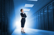 Businesswoman standing in data center