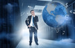 Businessman standing in data center with currency graphics and e