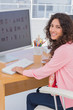 Happy editor at her desk
