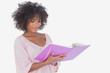 Beautiful woman looking at photo album