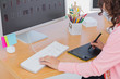 Photo: Editor using graphics tablet Editor using graphics tablet