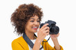 Happy girl taking a photo