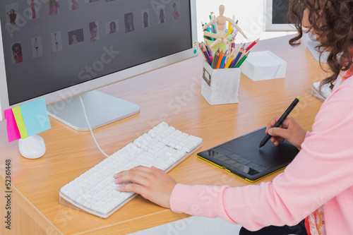 Photo: Editor using graphics tablet Editor using graphics tablet