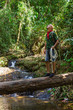 Foto: Travelling man in tropical jungles of South East Asia Travelling man in tropical jungles of South East Asia