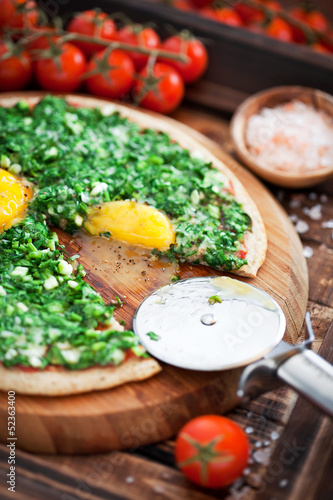 Photo: Pizza from oat bran with spinach, green onions and eggs Pizza from oat bran with spinach, green onions and eggs