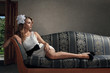 Beautiful woman seated on a sofa