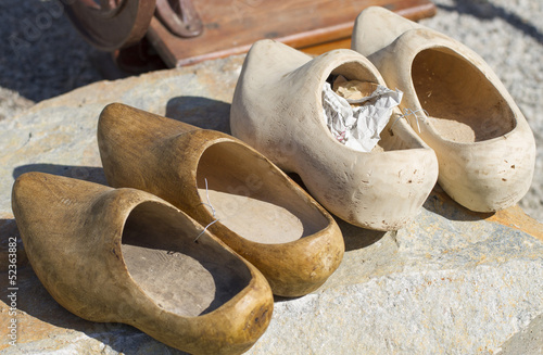 Photo: pairs of old wooden clogs pairs of old wooden clogs