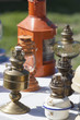 old copper and brass oil lamps at flea market