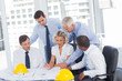 Architects working on construction plan
