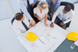 Business people working on construction plan